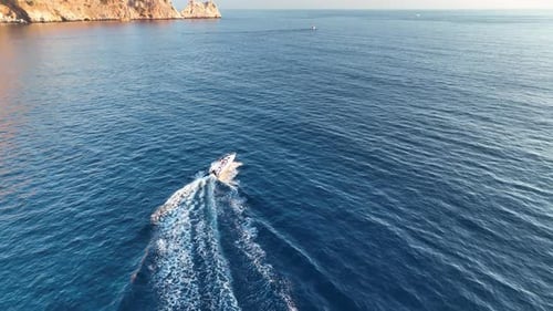 Sports Boat Sails and Makes Beautiful Turns Aerial View 4 K