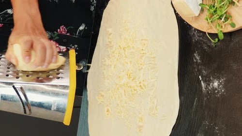 Grating Cheese Over Dough, Food Preparation