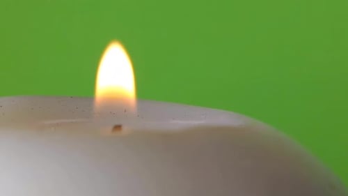 Lighter Lighting Candle On Green Screen Close Up