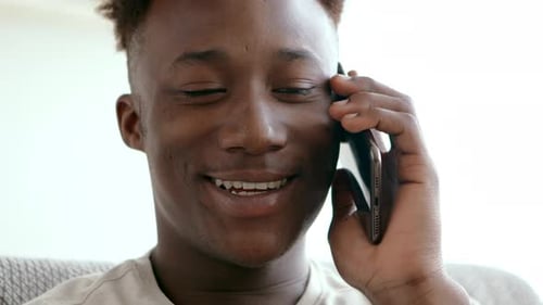 Young Adult Talking on Cell Phone Close Up