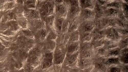 Macro Shot of Knitted Beige Wool Textile