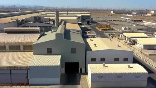 Drone shot from a industrial factory warehouses