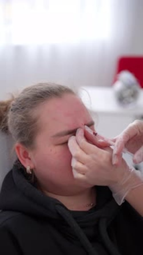 Woman Receiving Cosmetic Facial Injections in Clinic Concept of Skin Rejuvenation Procedure