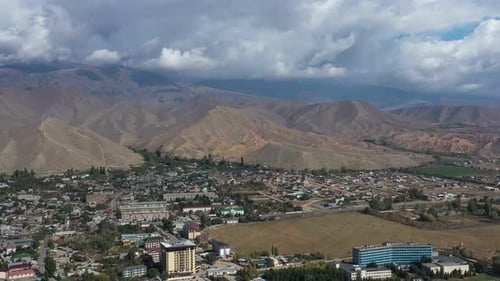 Aerial View of Cholpon Ata City Surrounded By Mountains