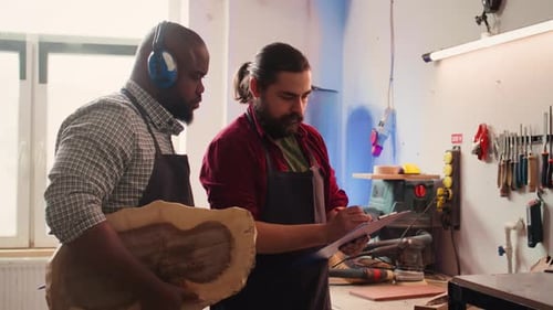 Woodworkers Collaborate on Project in Bright Workshop