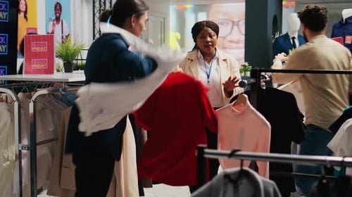 Shoppers Hunting for Bargains in Outlet