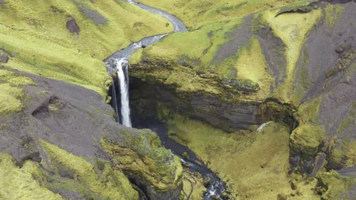 Drone Over Seljalandsfoss Waterfall In Valley