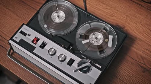 Vintage Reel-to-Reel Tape Recorder Playing Music