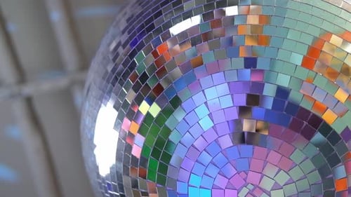 Closeup Disco Ball Hanging on the Ceiling Mirrored Sphere Reflecting Modern Nightclub Vibes with