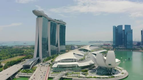 Drone Aerial view 4k Footage Of Singapore Skyscrapers With City. Corporate Offices Singapore.