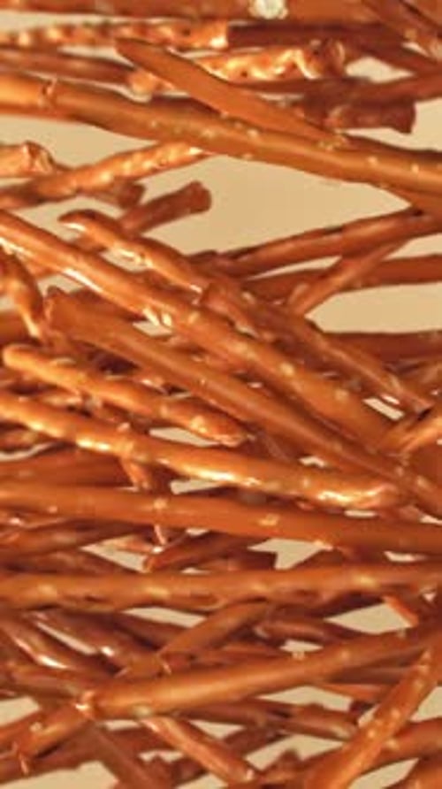 Salted Cracker Sticks Fly and Fall Filmed on a Highspeed Camera at 1000 Fps