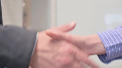 Close Up of Business People Shaking Hand