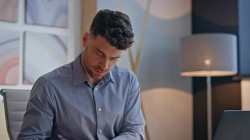 Serious Businessman Working Office Typing Laptop Computer at Morning Closeup