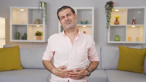 Man experiencing stomachache.