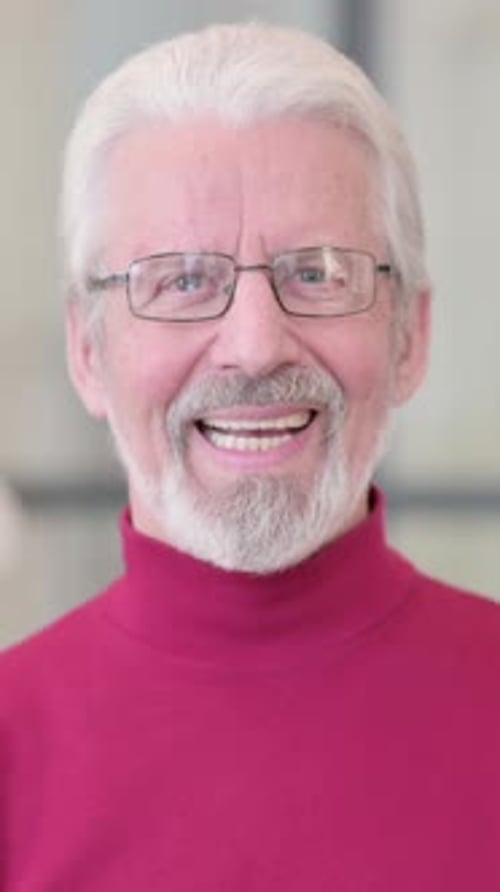 Senior Man Smiling Portrait with Glasses and Gray Hair