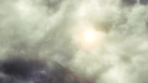 sunshine covered by cumulonimbus clouds in the sky.