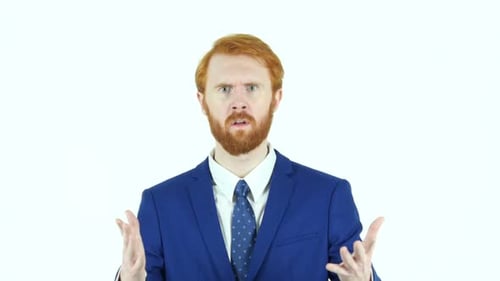 Man Gesturing in Blue Suit on White Background