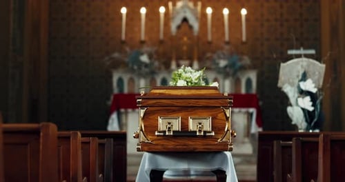 Coffin, church and funeral service in closeup, memorial and event to celebrate life