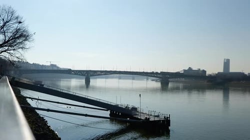 Budapest city trafic over the bridge in the distance