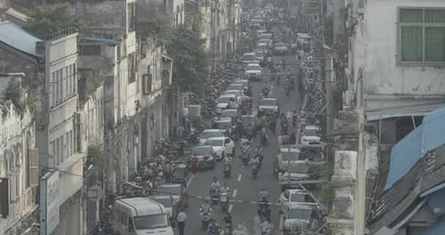 Traffic Drives Through A Busy Street, China
