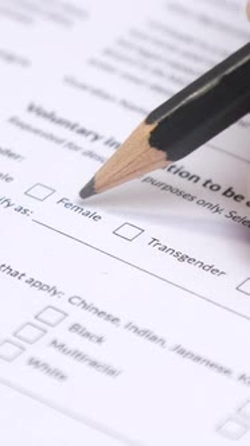 Filling Out Gender Form with Pencil, Transgender Option