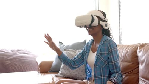 Woman Using VR Headset Experiencing Virtual Reality