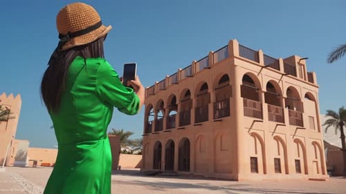 Visitor By Historic Old Palace In National Qatar Museum