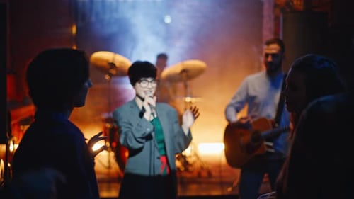 Band Performing Live on Stage in Urban Venue