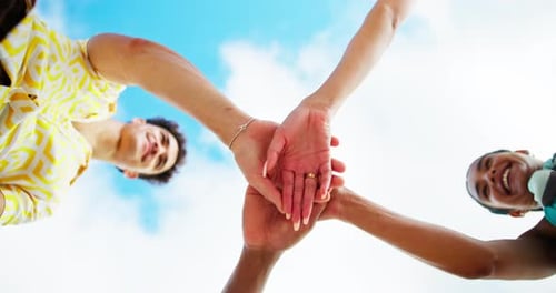 Hands stack, friends and people with unity, below and happy for collaboration