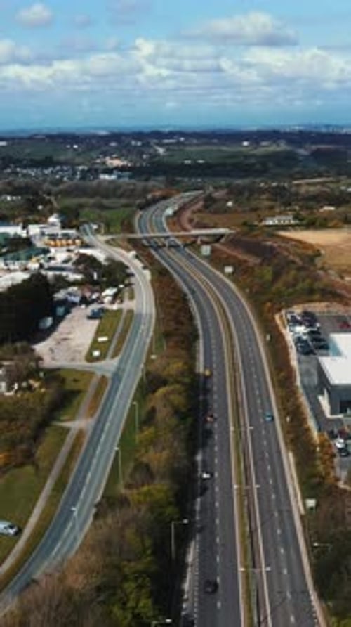 Cars are moving on the highway.Parking with many different vehicles Vertical video