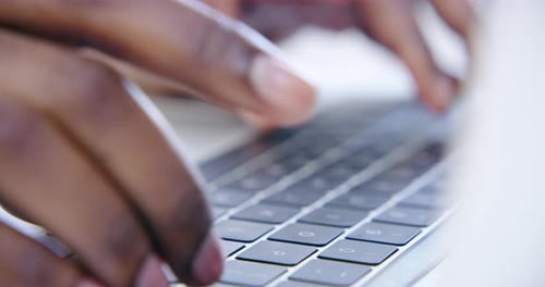 4k video footage of a businessman using his laptop at the office