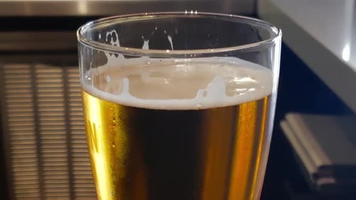 Refreshing Beer in Glass Close Up