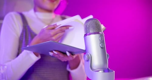 Girl, hands and influencer in home with microphone, neon and pleasure for social media