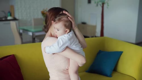 Loving Tender Caucasian European Young Mum Holding Adorable Cute Baby Girl