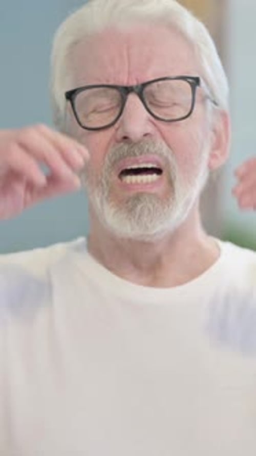 Senior Man Feeling Severe Headache Pain