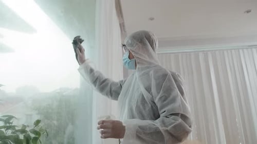 Cleaning Service Worker Cleaning Window in House