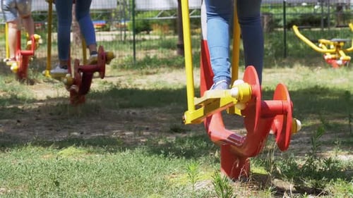 People Engage in Sports Training Simulators on the Street