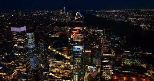 Luminous sparkling New York at night. Breath-taking scenery of the lively city from top.