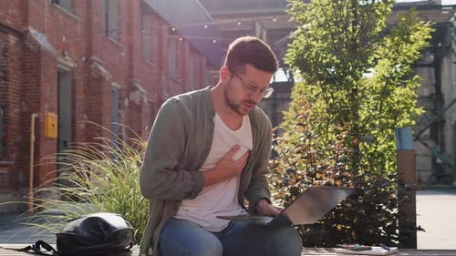 Risk of Heart Attack Trouble Breathing Male Feeling Pain in Heart Outdoors