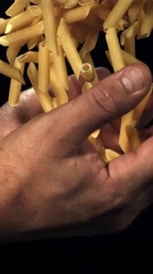 Dry Pasta Flies Up and Falls in your Hands Filmed on a Highspeed Camera at 1000 Fps