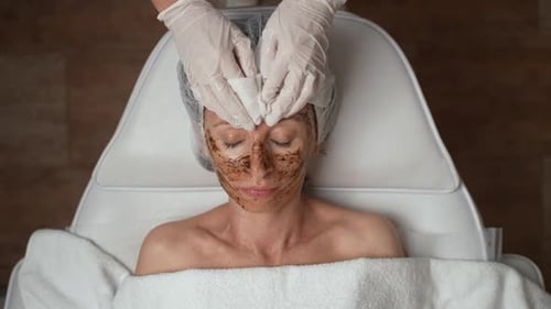 Woman Receiving Facial Treatment at Medical Spa