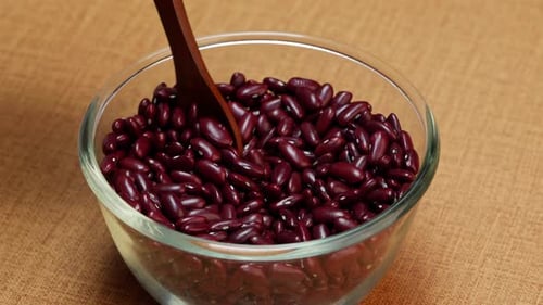 Kidney Beans in Bowl with Wooden Spoon