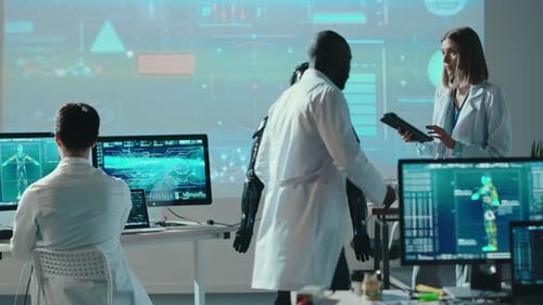 Team of Multiethnic Male and Female Engineers Perform Intelligence Tests on Black Futuristic