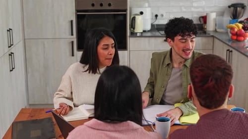 Group of Students Working Together on a University Project