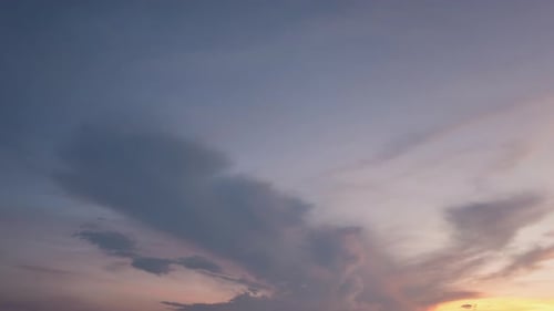 Sunset Sky with Soft Pink and Orange Clouds