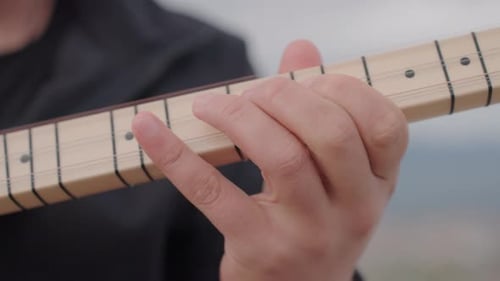 close up saz, baglama playing detail