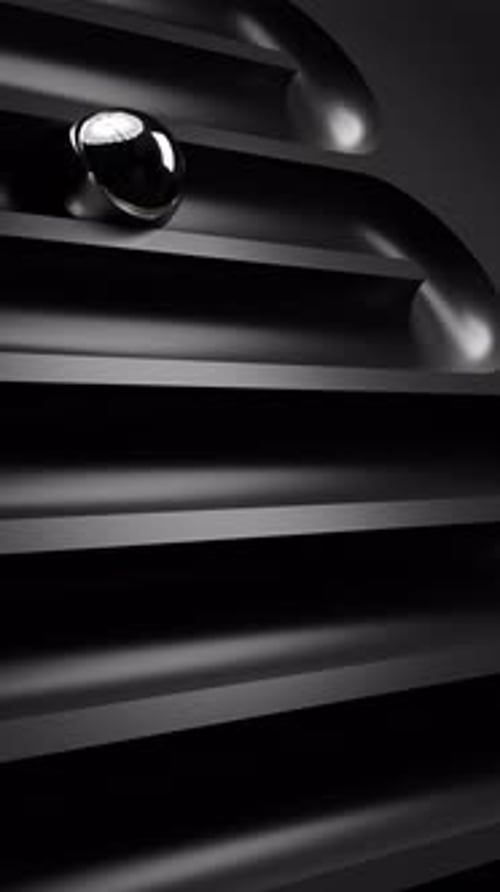 Abstract 3D Chrome Metal Ball Traveling Down Track Loop