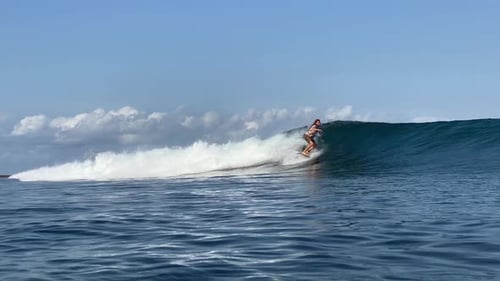Surfer Riding in the Indian Ocean