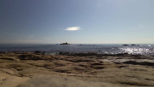 Low fixed frame view of coastline during a clear day
