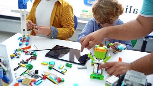 Robotics Programming Class Children Construct and Code Robot STEM Education Using Constructor